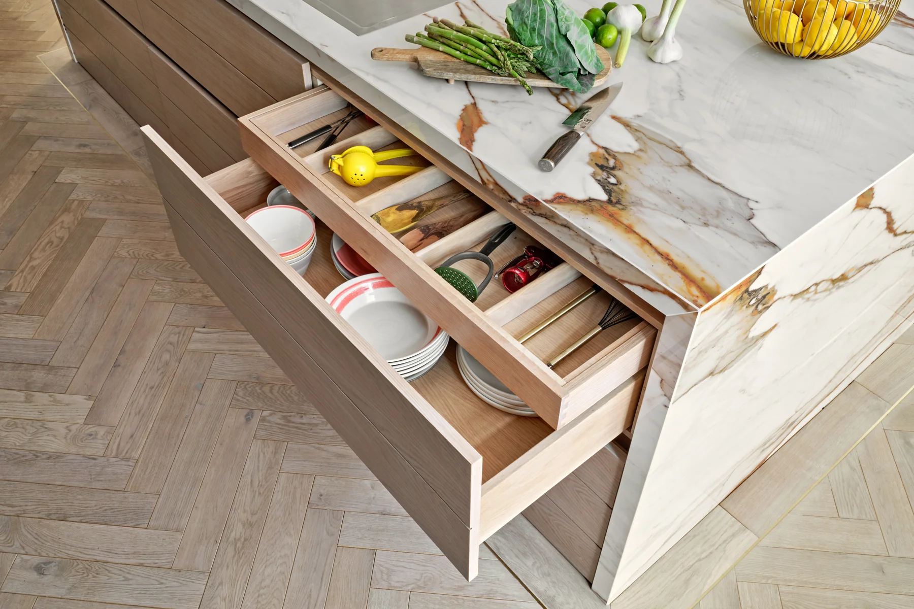 The Luxe Kitchen — Fitted drawer storage beneath the island worktop.